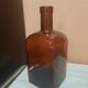 Bouteille en verre ambrée