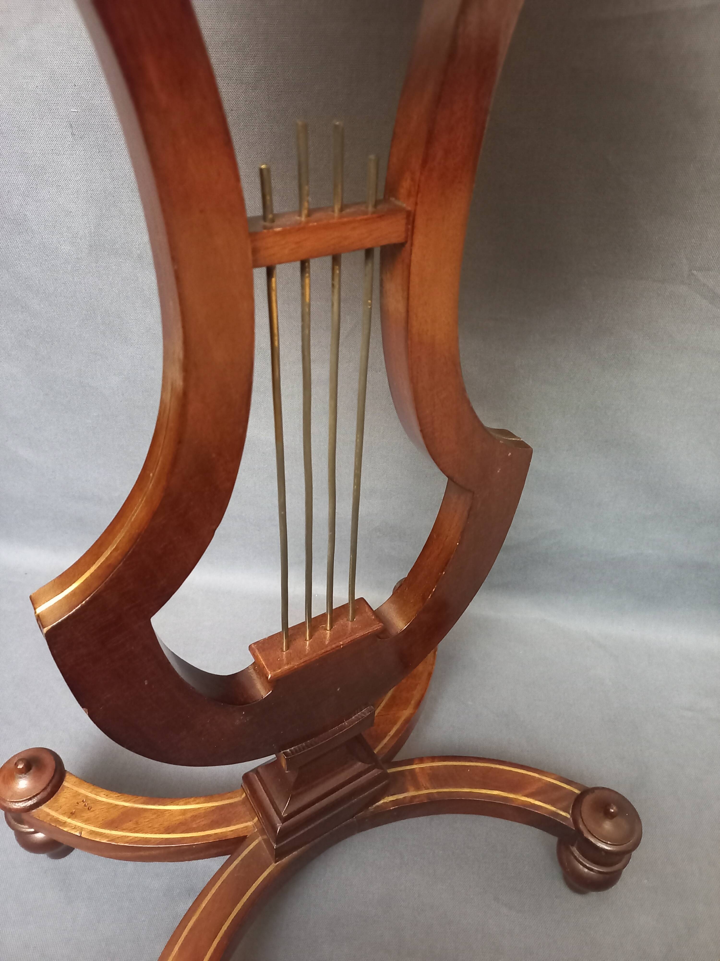 Small Lyre guéridon table, 19th century.
