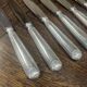 Set of 12 silver-plated metal knives, shell model, from CAILAR BAYARD