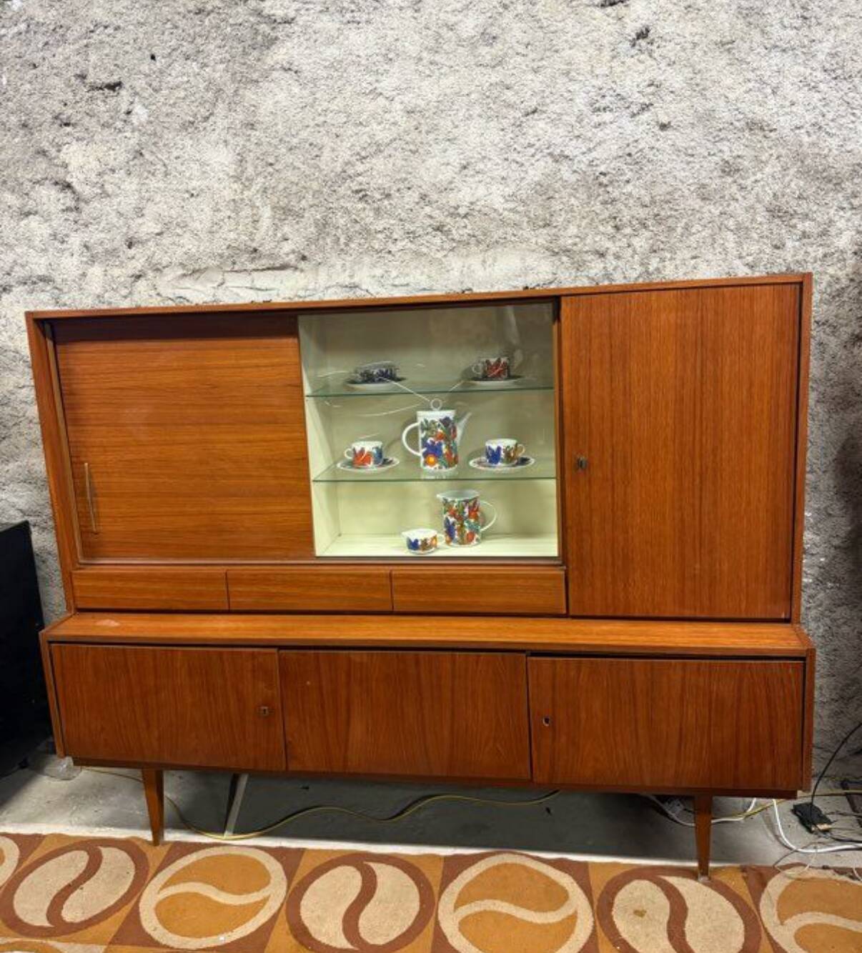 Vintage Scandinavian teak sideboard with compass feet from the 70s