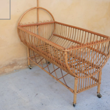 Vintage rattan crib, casters and matte for bed sky