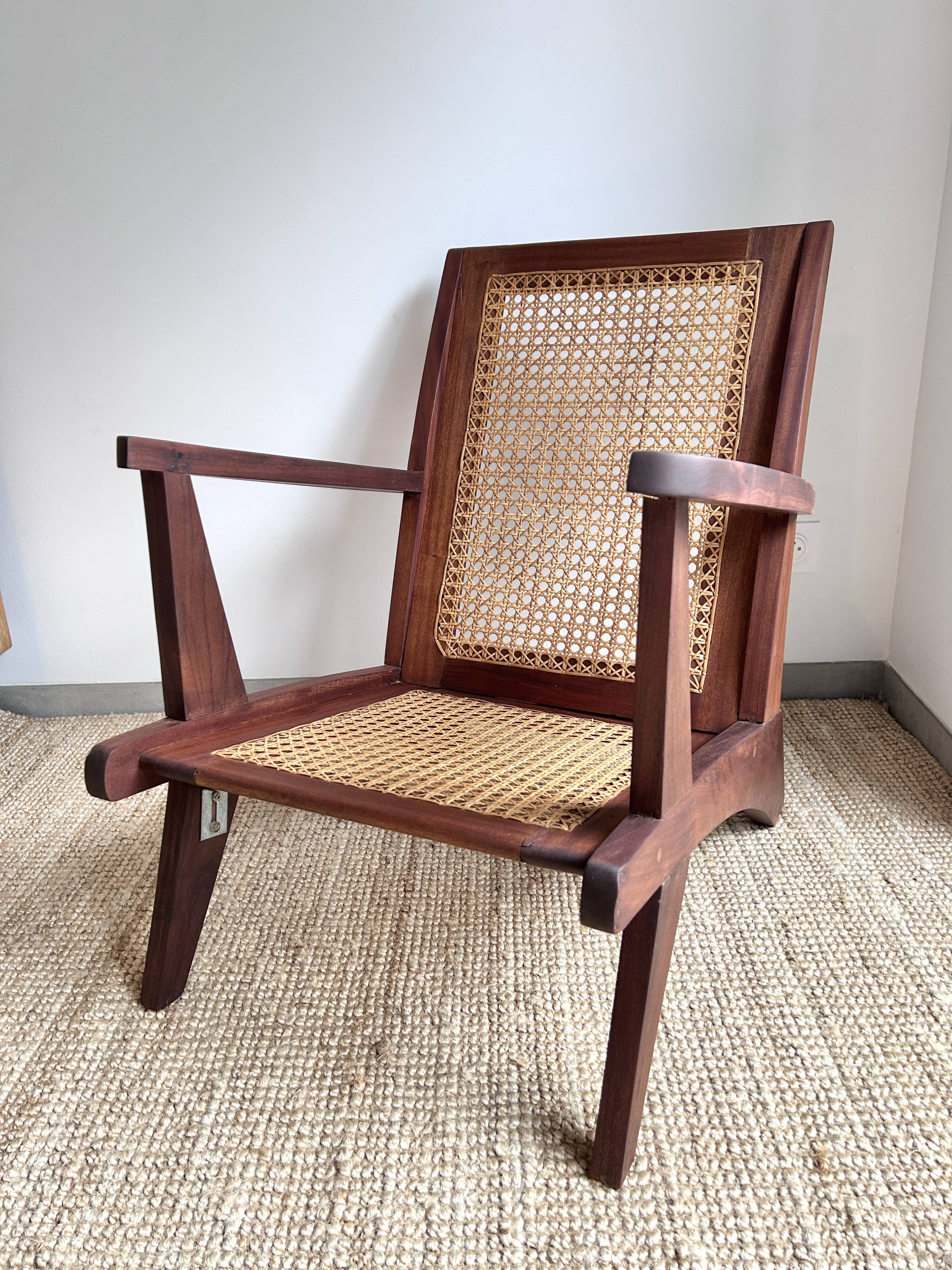 Reconstruction armchair in teak and caning