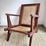 Reconstruction armchair in teak and caning