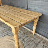 Old farmhouse table in raw wood