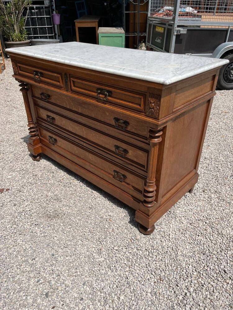 Commode with a white marble top