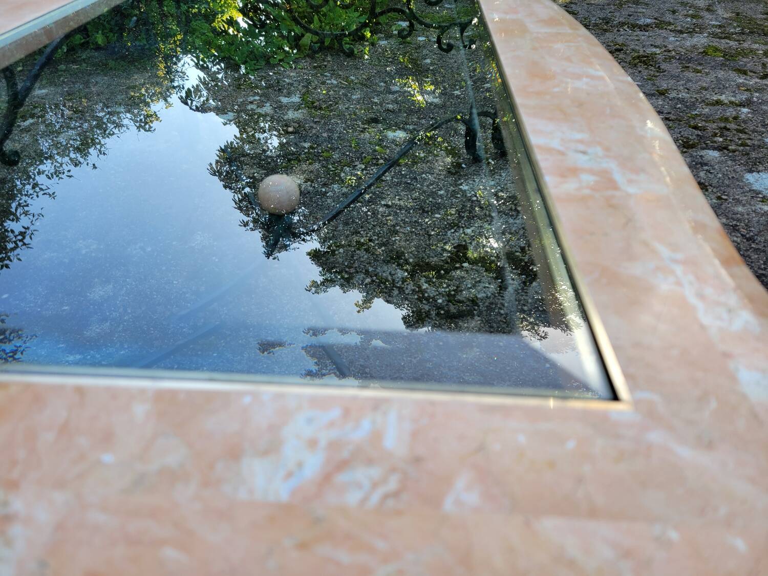 Pink marble and wrought iron coffee table