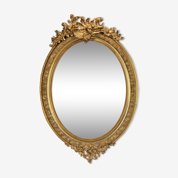 Mirror / oval ice Napoleon III period in wood and gilded stucco louis xv style