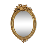 Mirror / oval ice Napoleon III period in wood and gilded stucco louis xv style