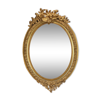 Mirror / oval ice Napoleon III period in wood and gilded stucco louis xv style