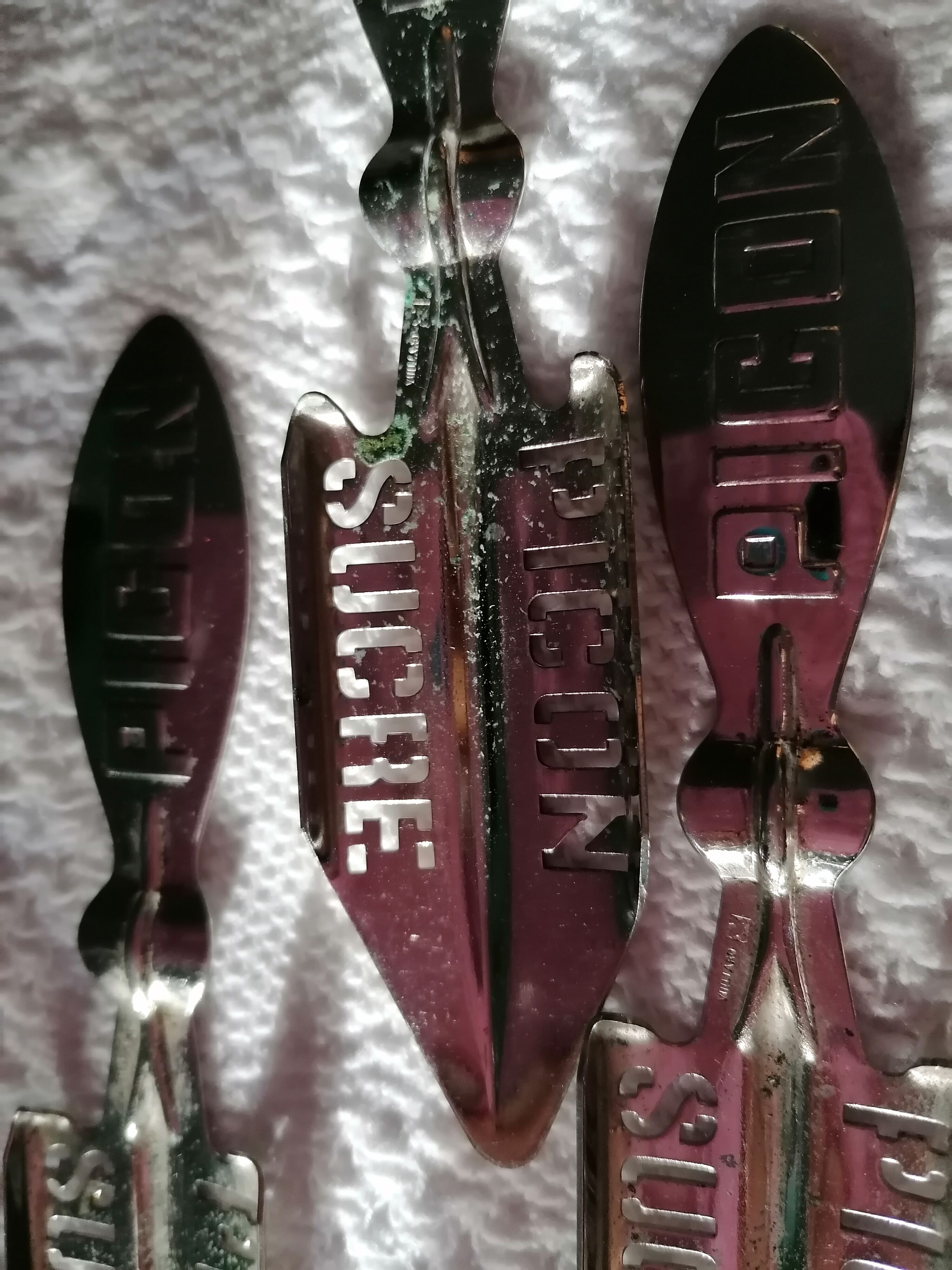Absinthe service glasses and spoons.