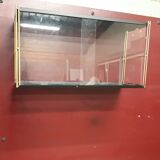 Wall-mounted Tomado showcase 1960