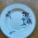 Deep plates Sarreguemines with carnation bouquets