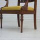 1920-30s, carved wood armchair, design after Georges Jacob, reupholstered.