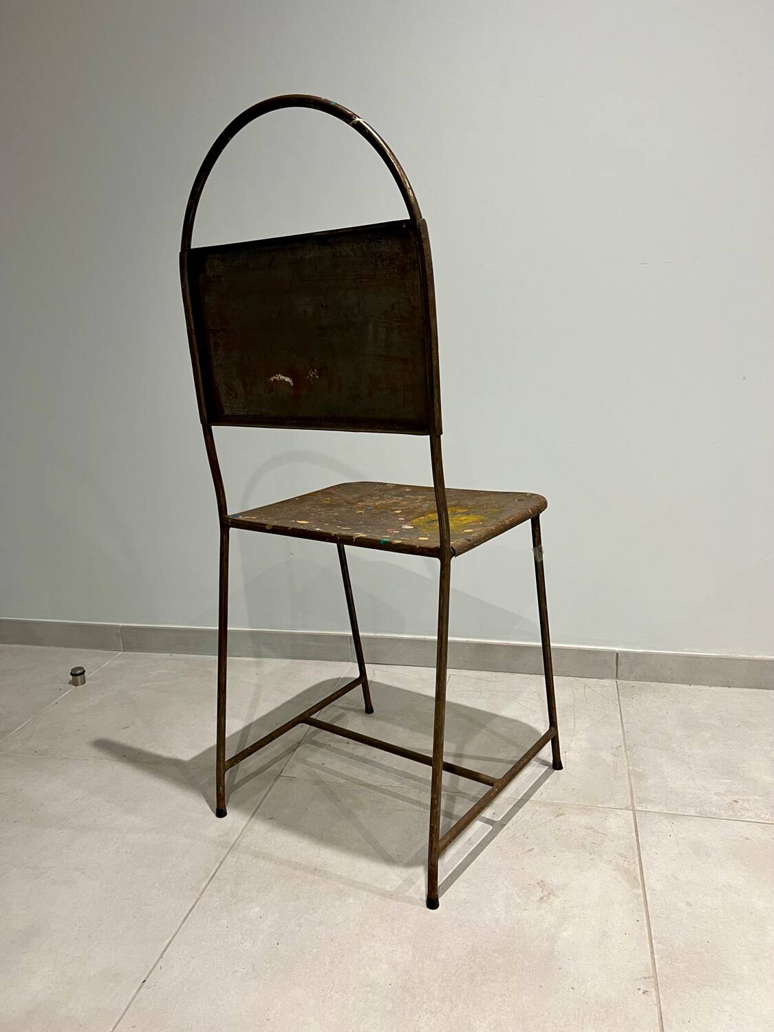 Pair of vintage raw metal chairs