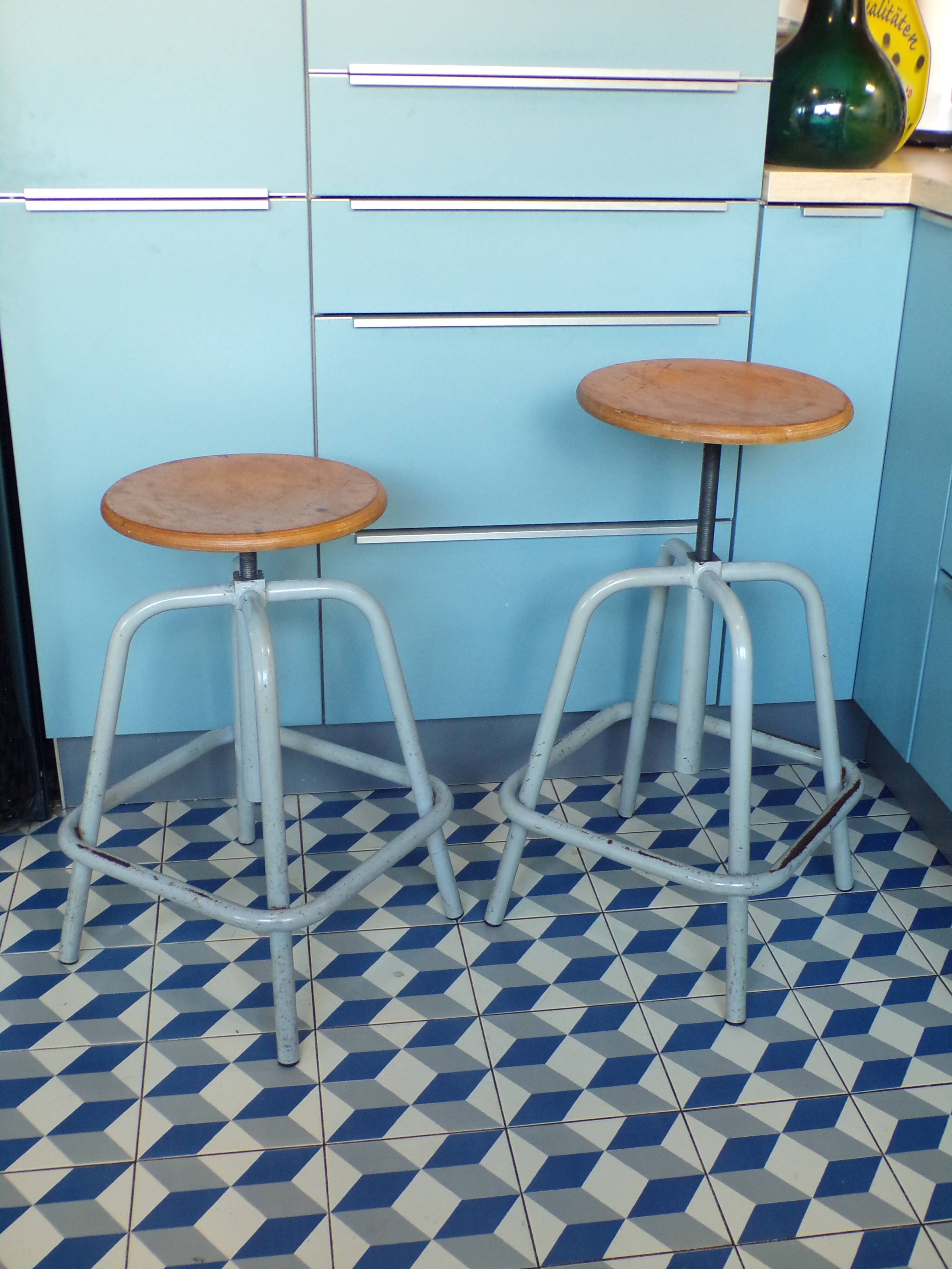 Pair of Unic screw workshop stools