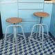 Pair of Unic screw workshop stools
