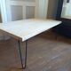 Coffee table in solid bamboo with steel legs.