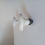 Pair of antique oval door handles in porcelain and brass.