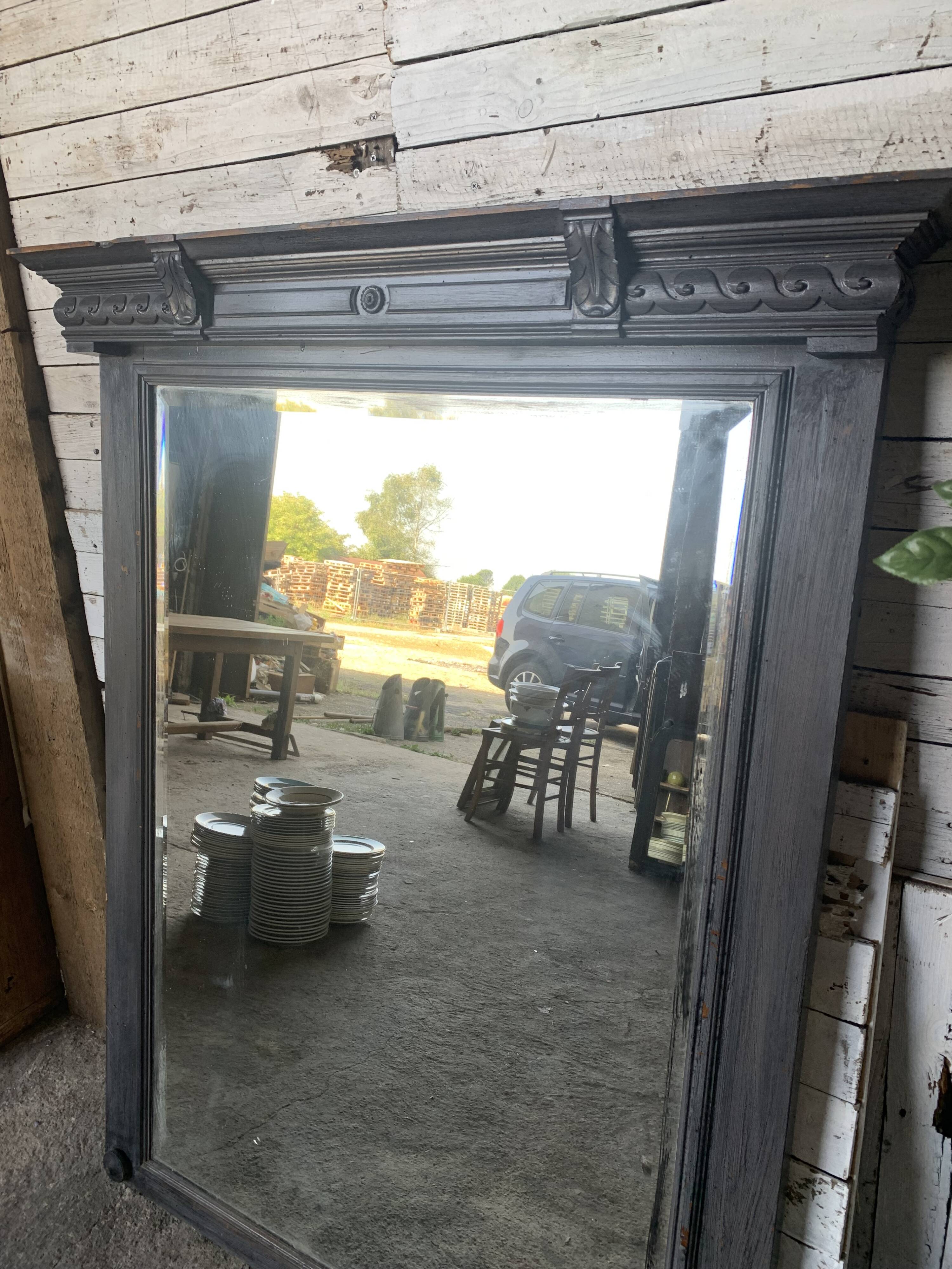 Wooden mirror with juice patina
