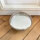 Openwork metal round mirror top
