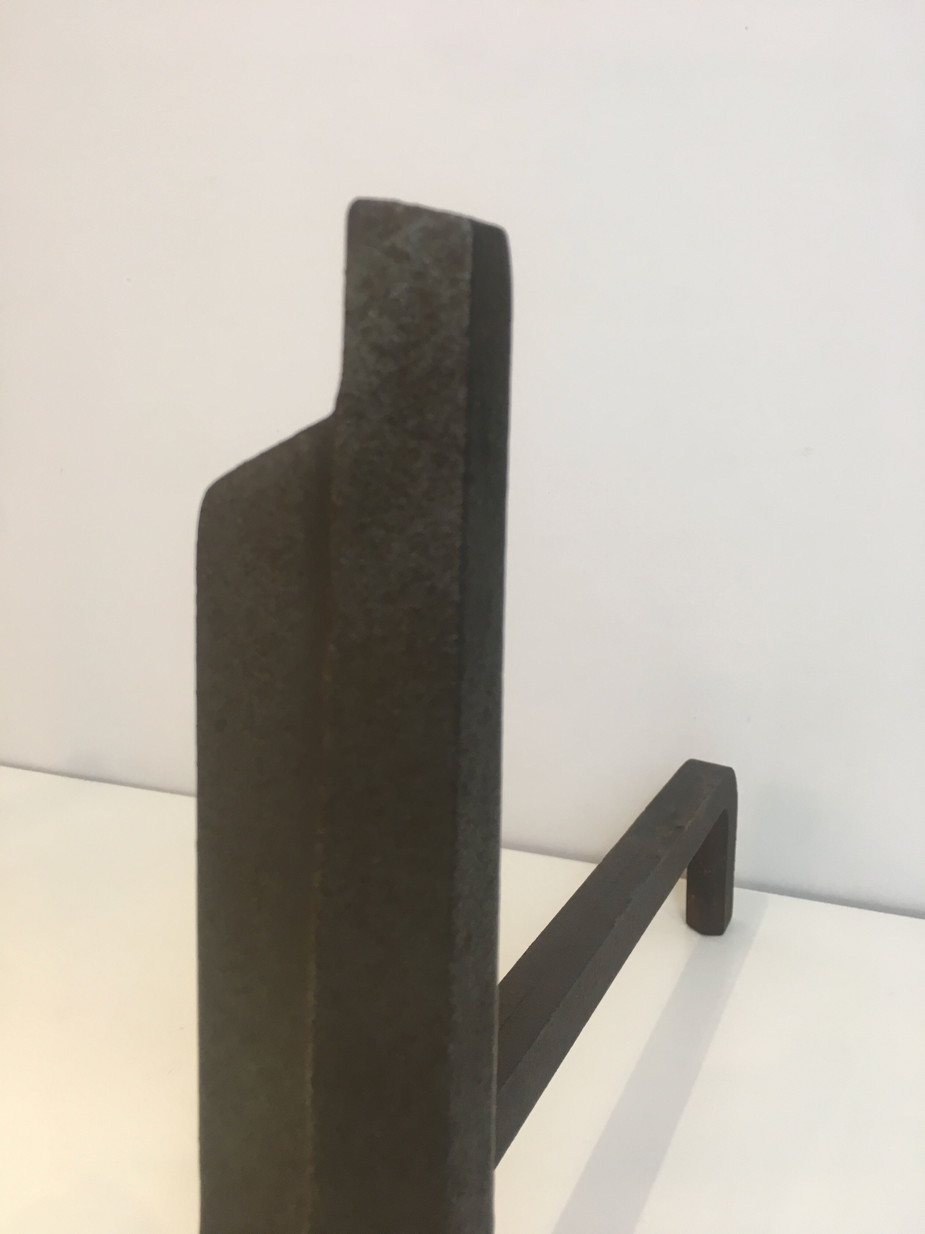 Pair of modernist chenets in cast iron and iron