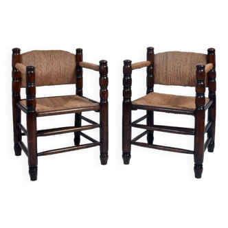 Pair of turned wood and straw armchairs, 1950s.