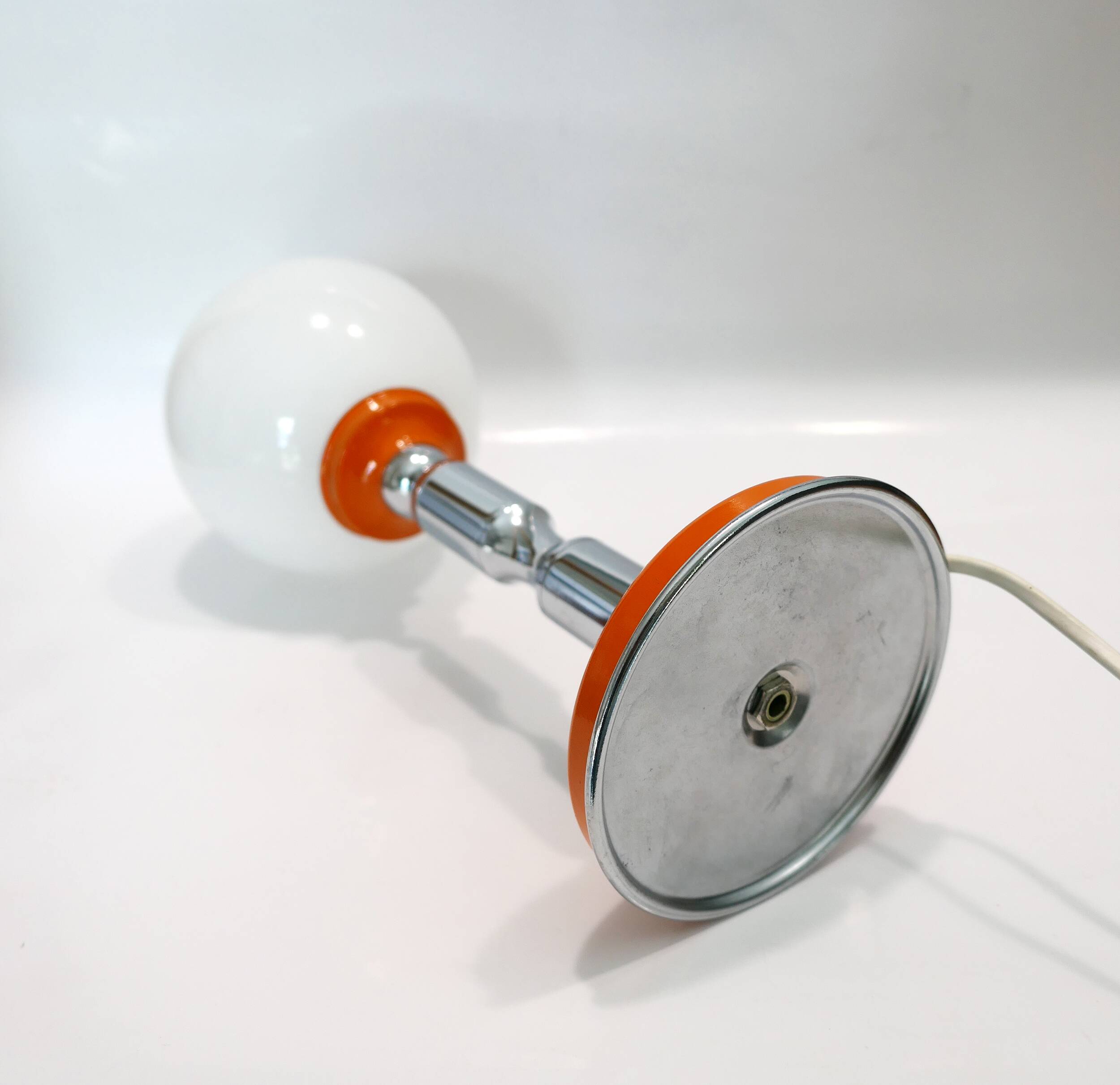 1970s chrome and orange table lamp design