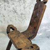 Brutalist tripod low chair
