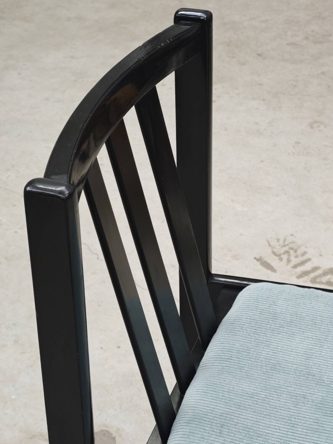 Set of 4 modernist black chairs with light blue ribbed fabric