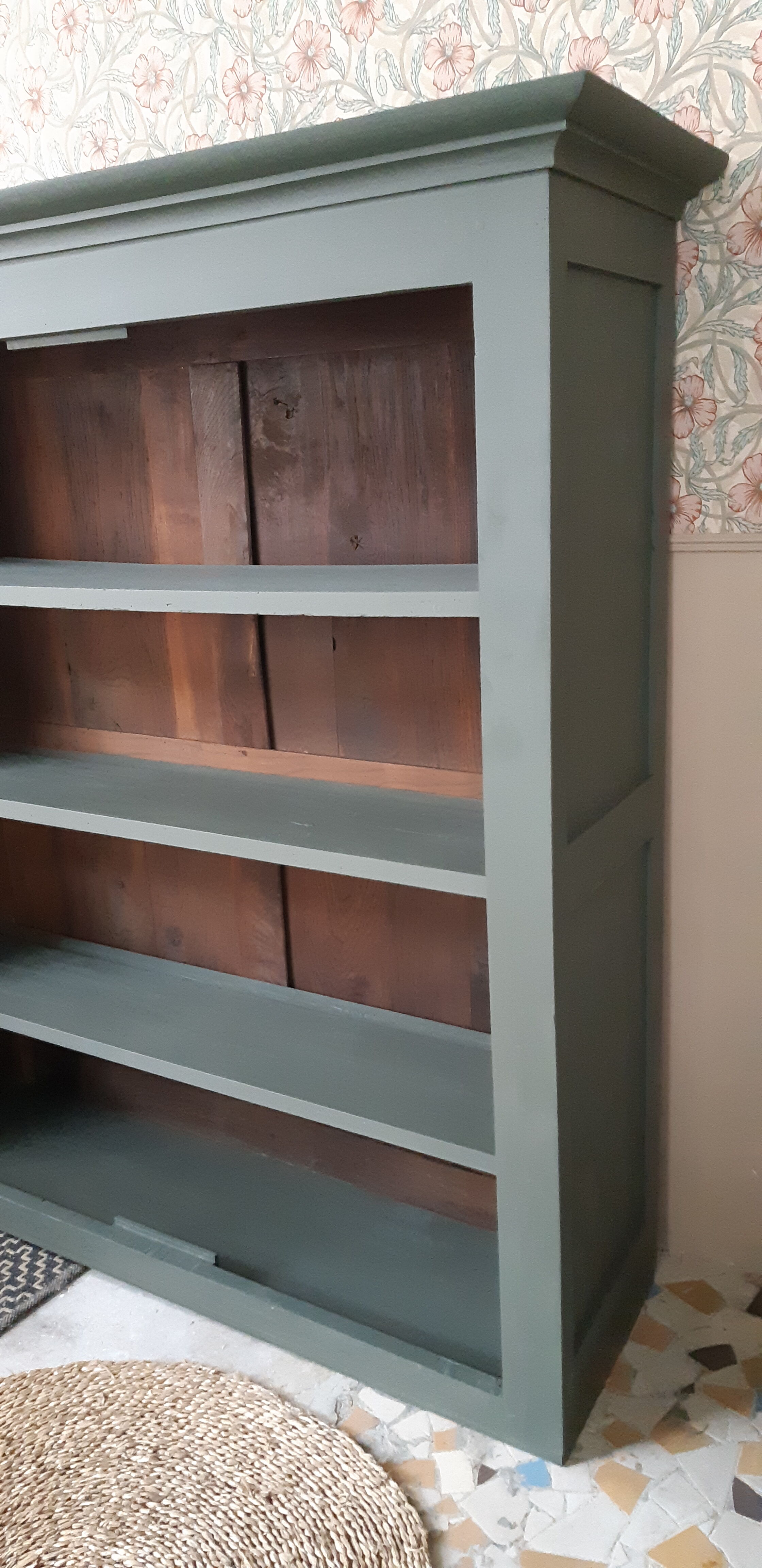 Wood and khaki green bookcase