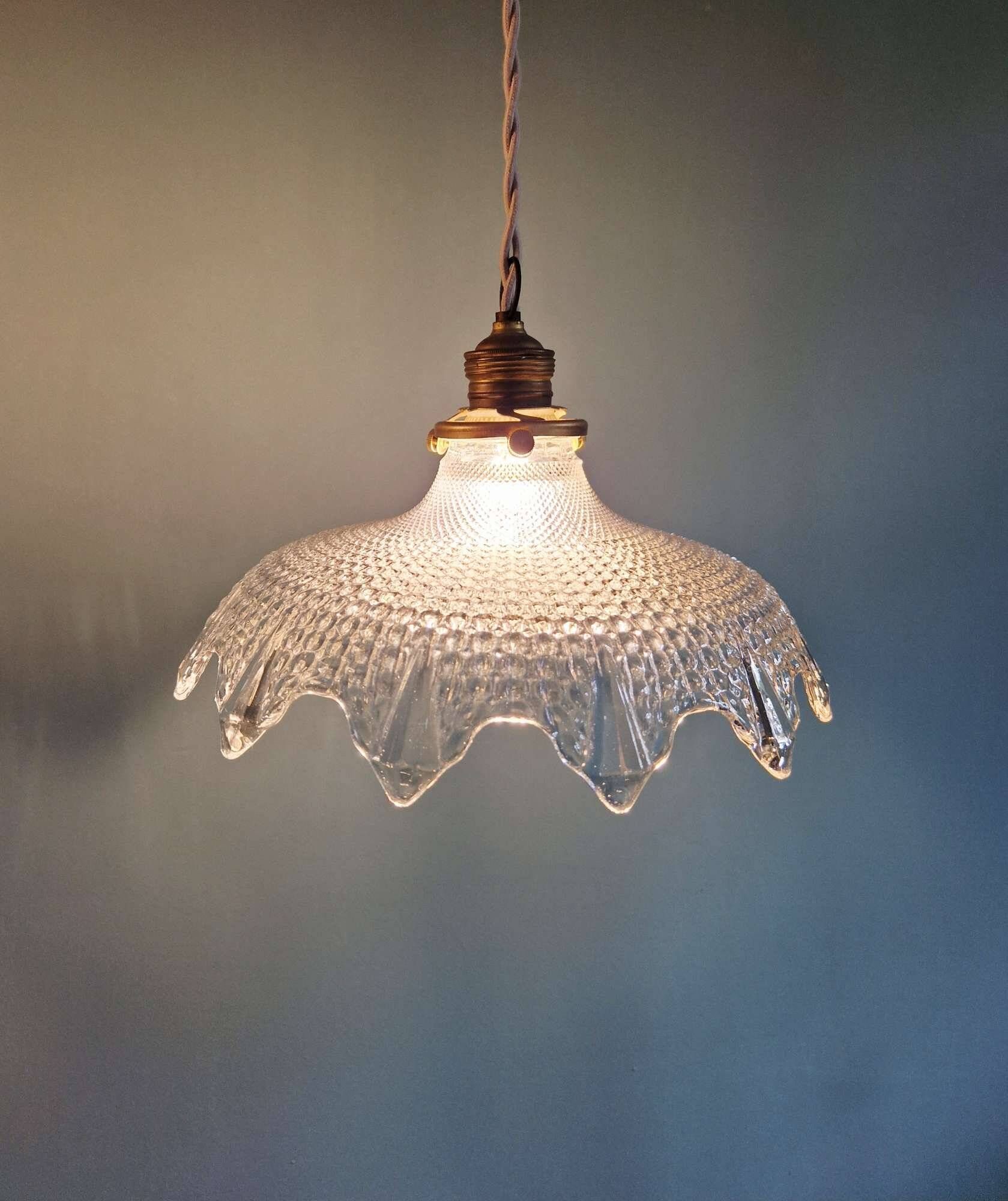 Trio of Art Deco scalloped clear glass pendant lights, 1920-30