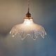 Trio of Art Deco scalloped clear glass pendant lights, 1920-30
