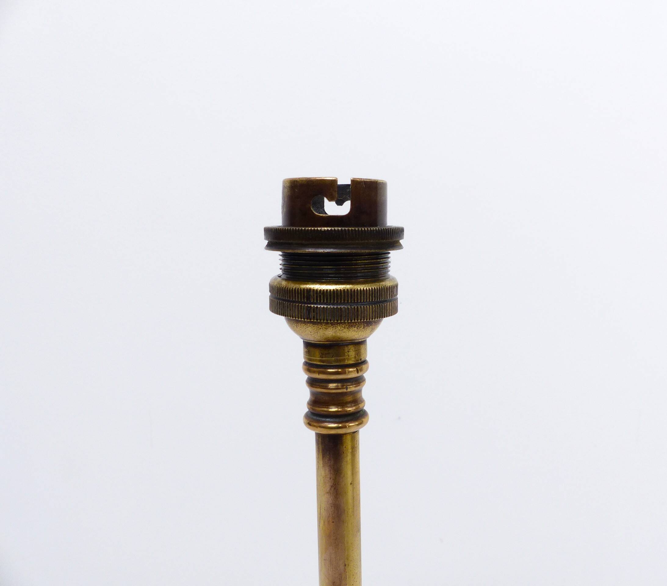 Articulated tripod lamp base in brass, Arts & Crafts style, in the manner of.