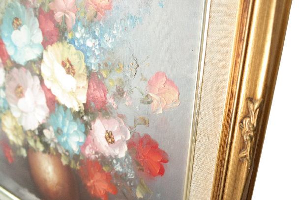 Tableau of a bouquet of flowers in pastel tones signed by Frederick.