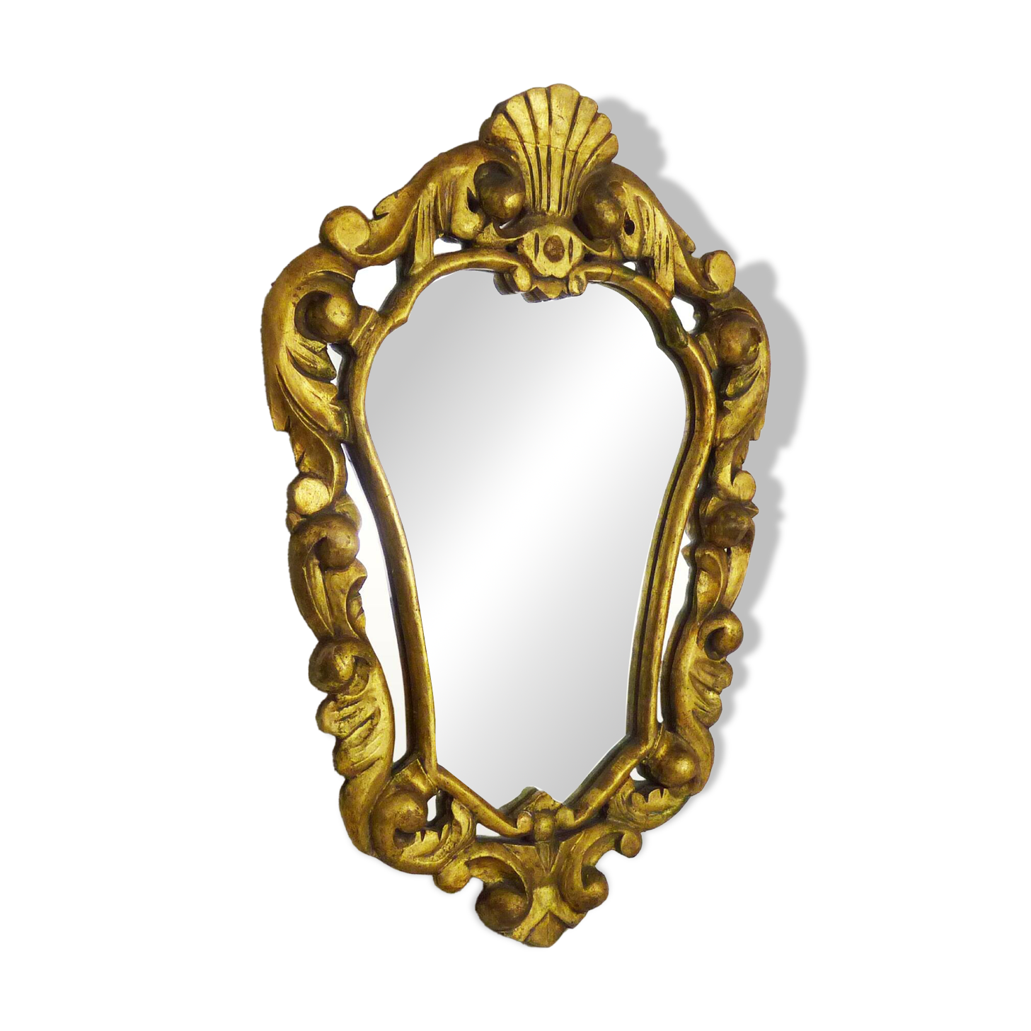 Old wall mirror in wood and gilded stucco with shell decoration, Louis XV style pediment mirror