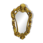 Old wall mirror in wood and gilded stucco with shell decoration, Louis XV style pediment mirror