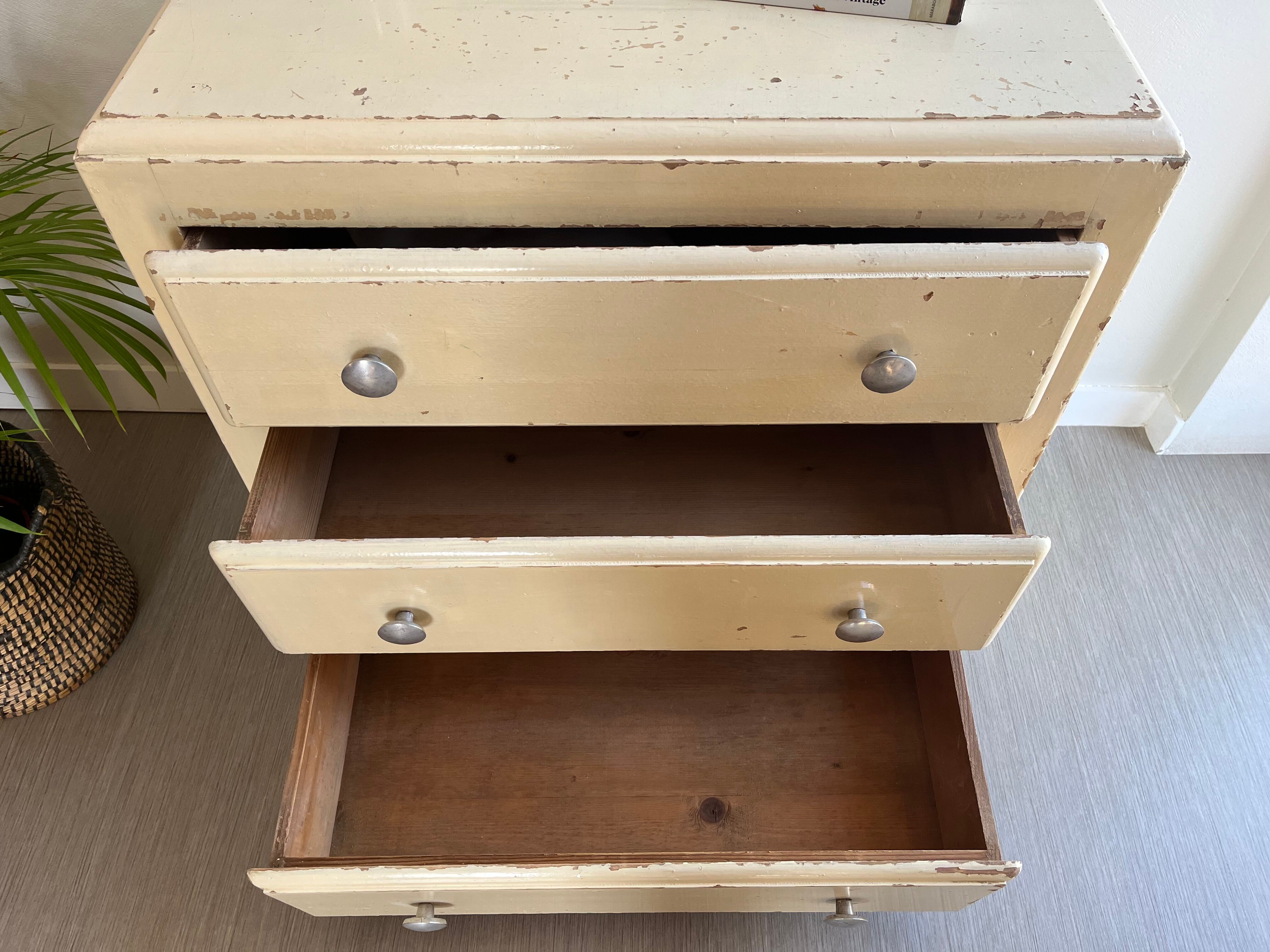 Vintage patinated wood chest of drawers