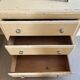 Vintage patinated wood chest of drawers