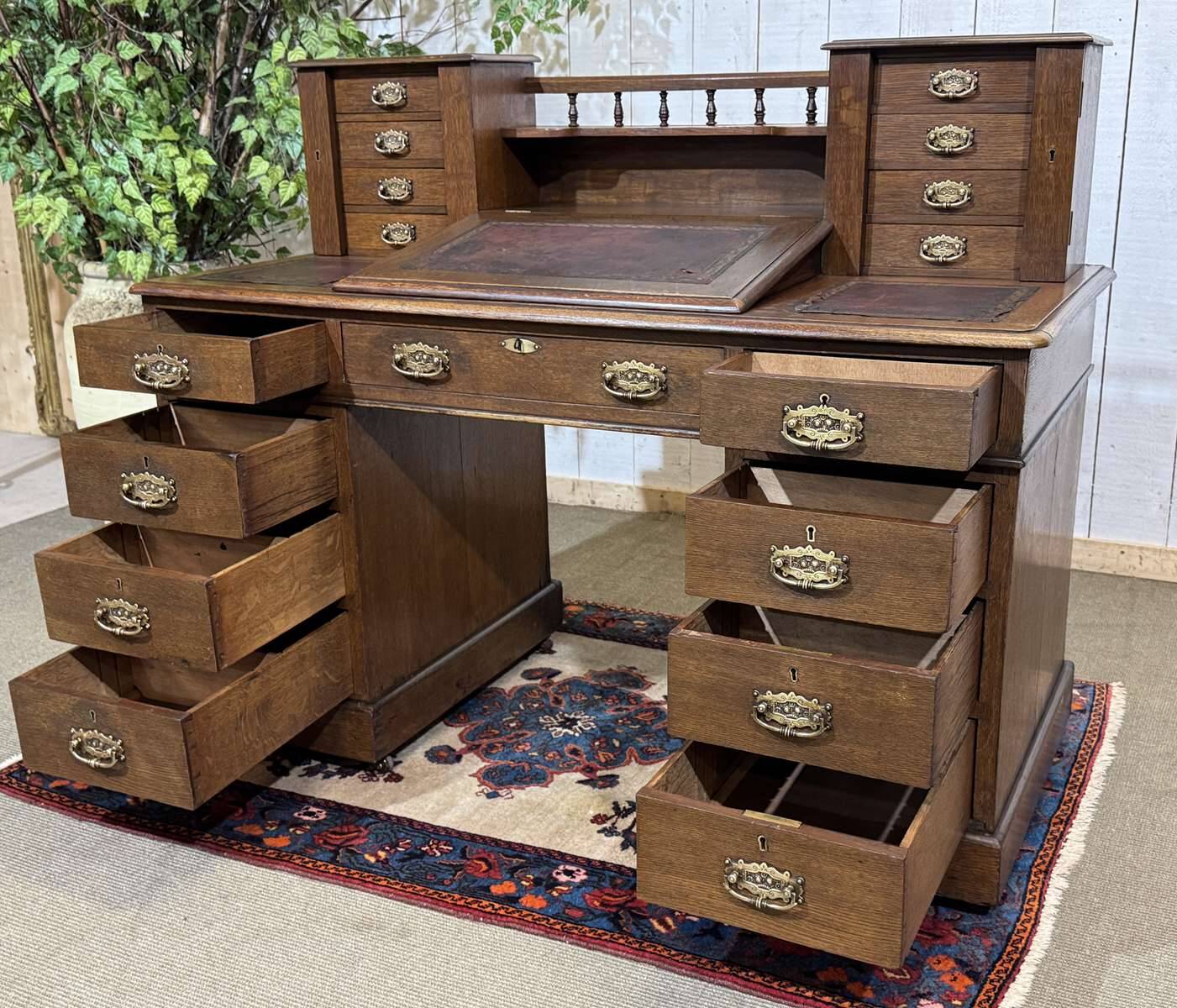 English oak graduated desk from the late 19th century.