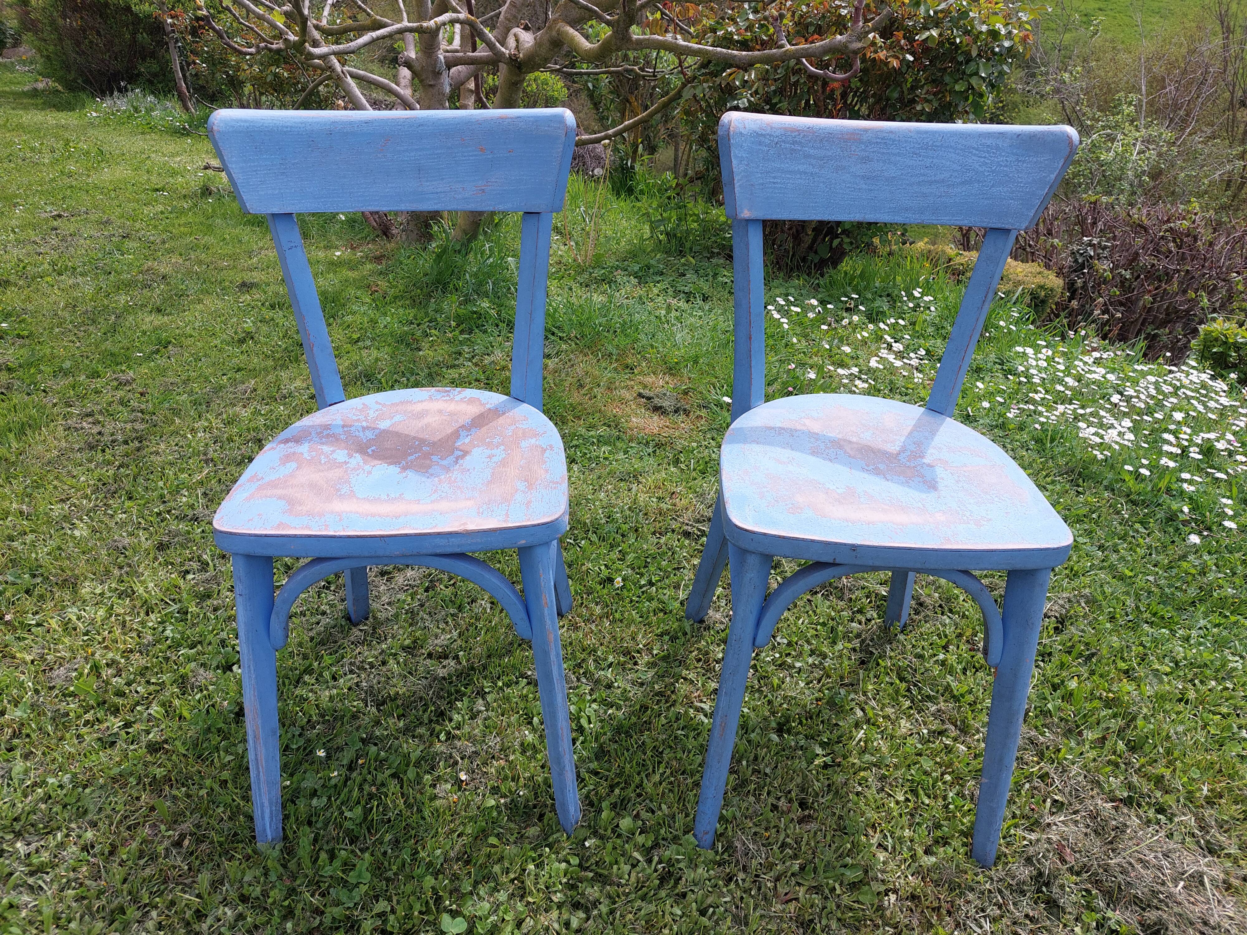 pair of chippy blue paint bistro chairs
