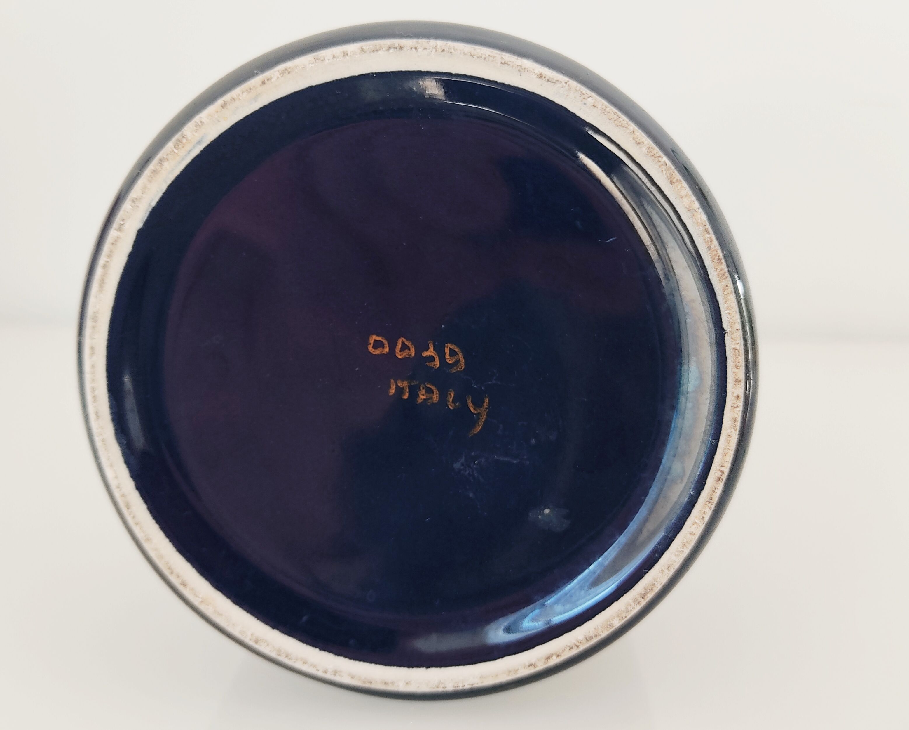 Dark blue ceramic roller vase