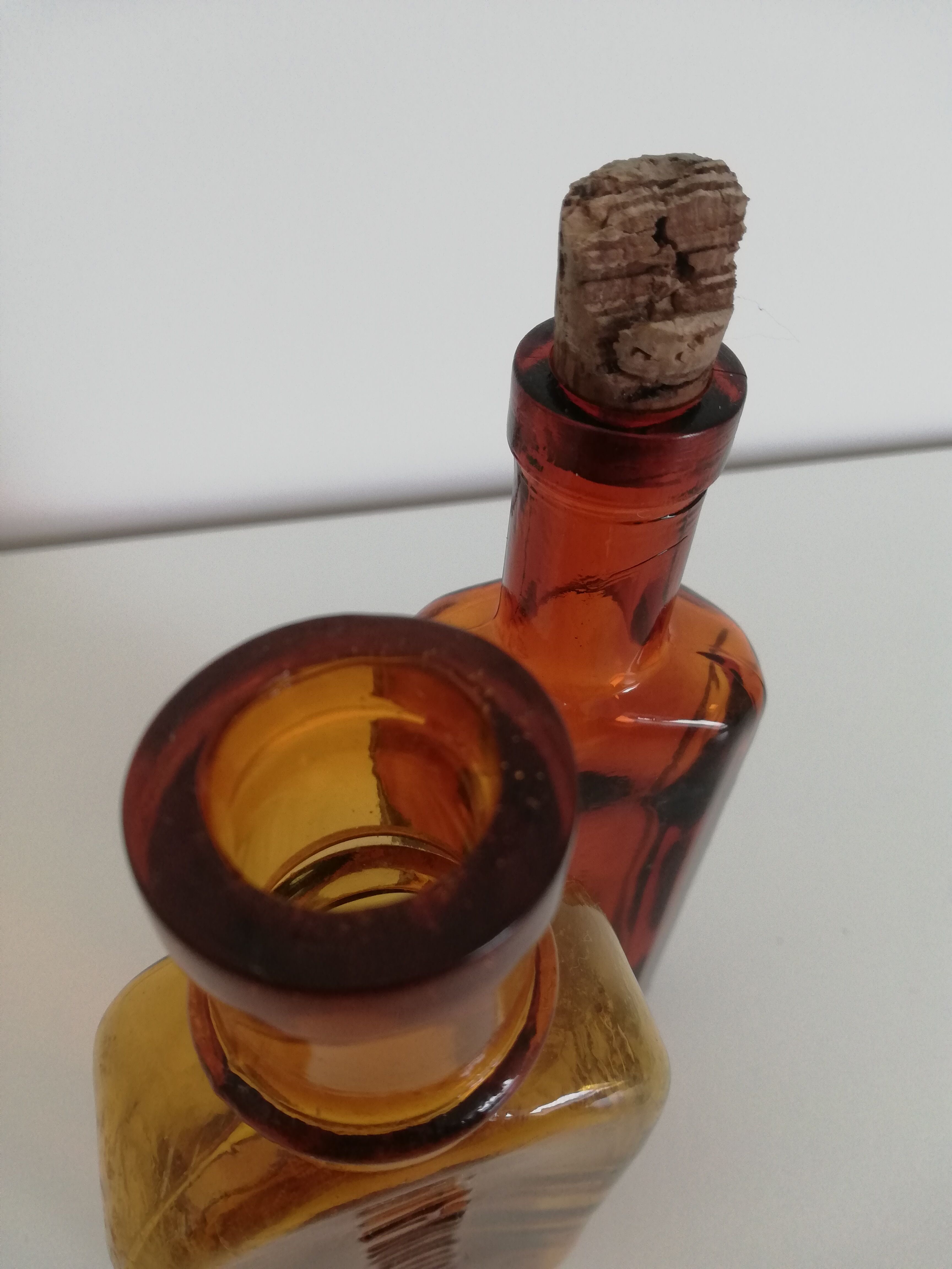 2 amber apothecary bottles