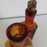 2 amber apothecary bottles