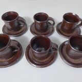 coffee service in iridescent stoneware cups and vintage sugar bowl