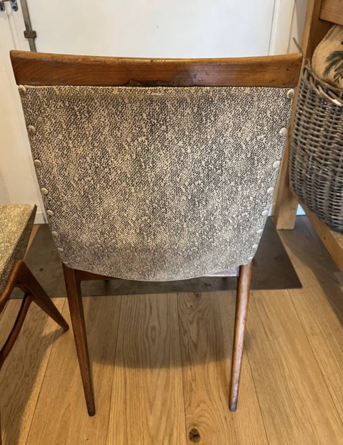 (Lot) 2 teak designer chairs (1950s)