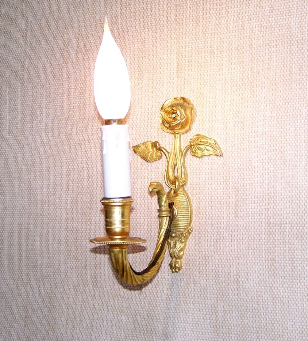 Simple wall sconce in classic Empire style made of vintage French cast brass 4316.