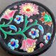 Pair of Longwy flower bottle underwear on black background. Rare