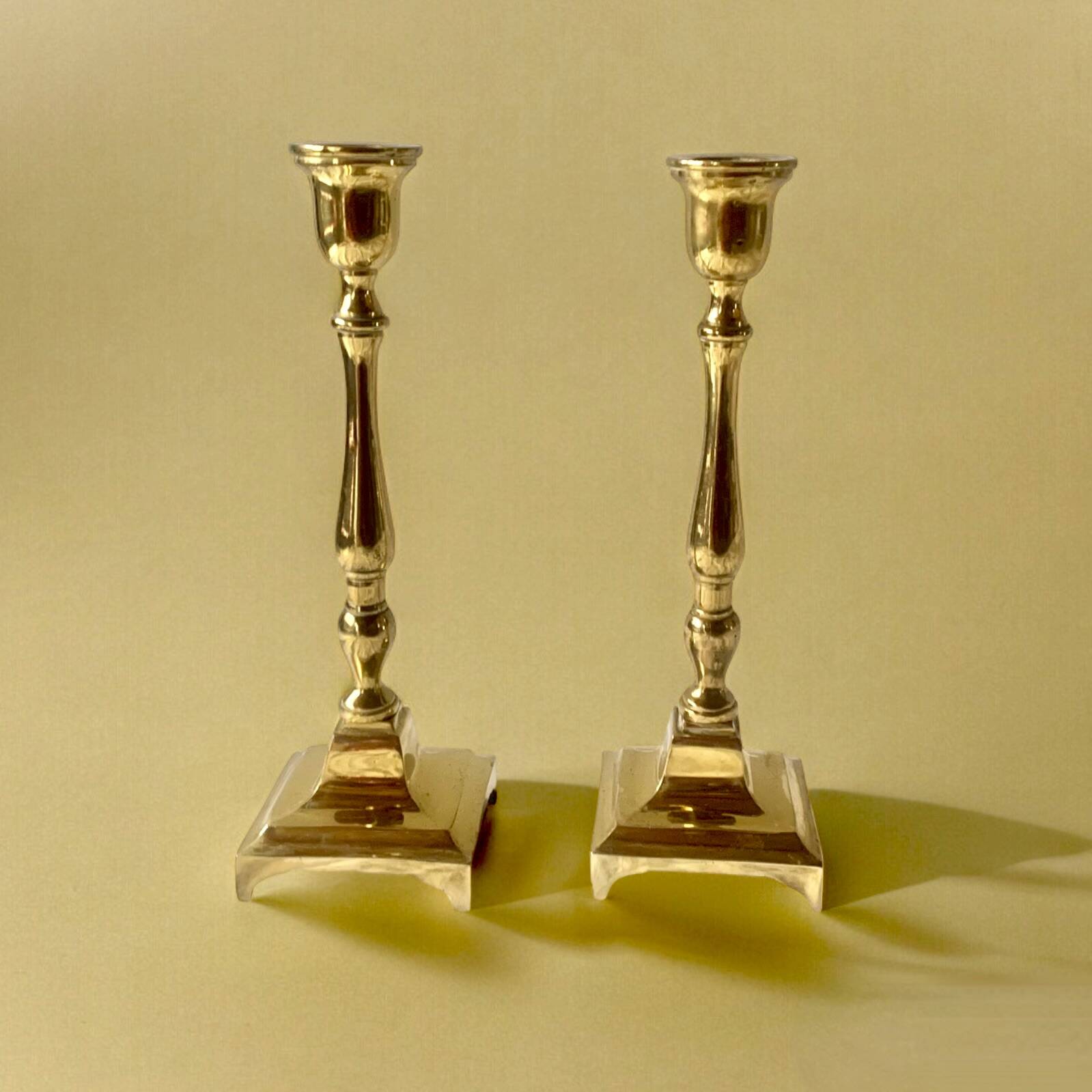 Pair of antique brass candlesticks