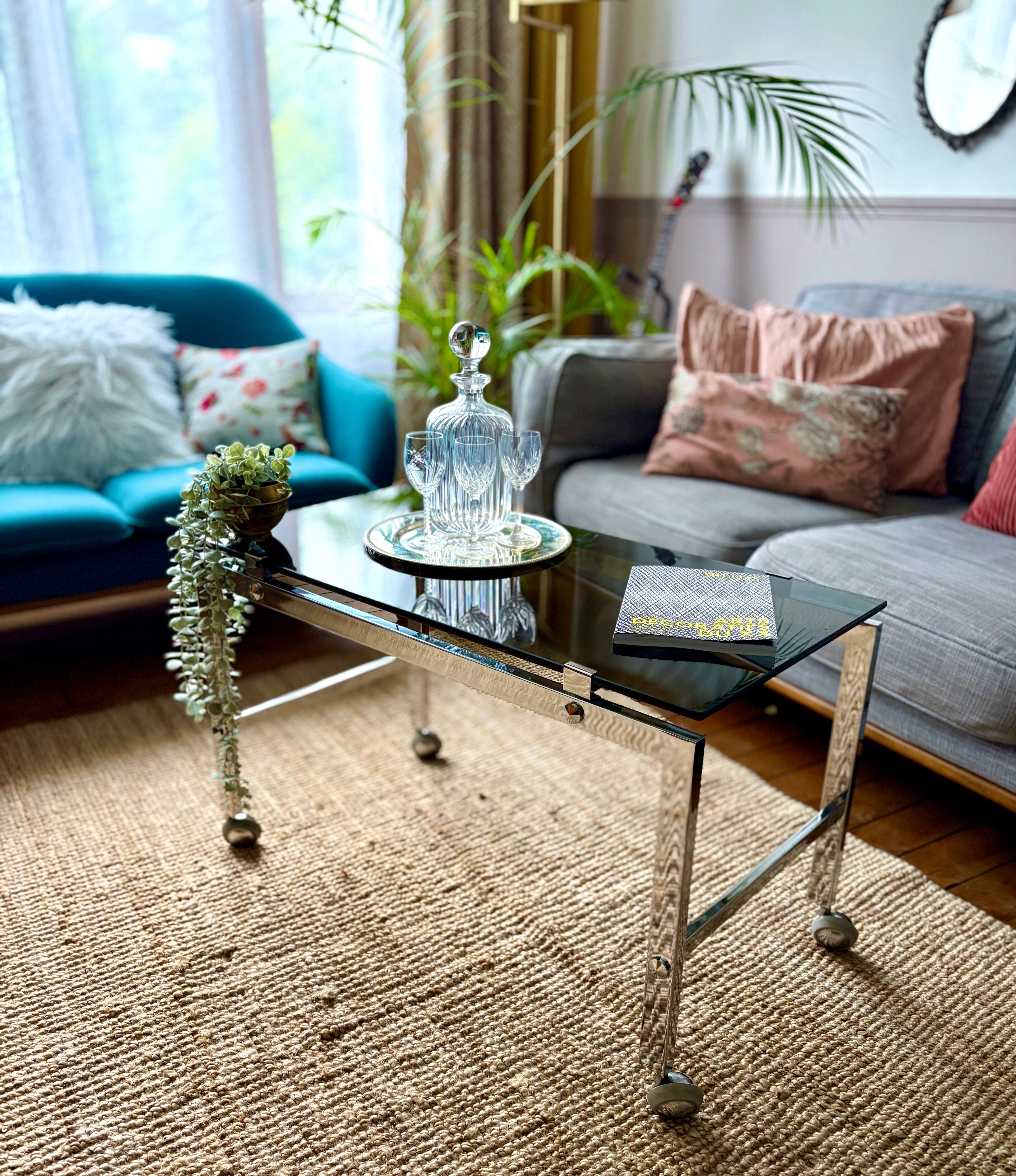 Chrome and smoked glass coffee table on wheels 1970