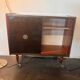 Large vintage bar cabinet from the 50s/60s – illuminated, sliding doors, on wheels.